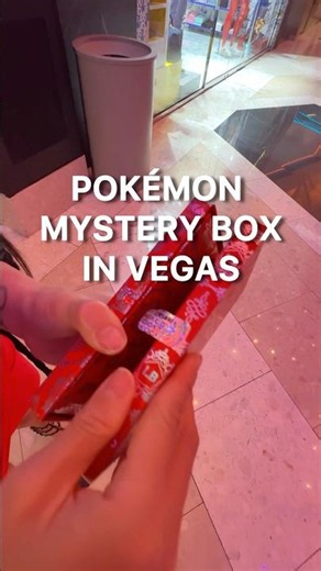 Pokémon mystery box vending machine unboxing in Vegas
