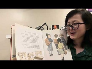 Reading the children books The Little Refugee by Anh and Suzanne Do