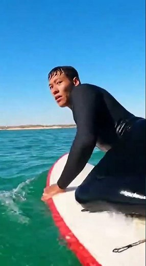 SHARK STRIKES SURFER'S BOARD!