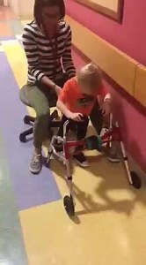 Wyatt "walked" over a mile on the treadmill today, and then worked on walking with his RGO braces. He got a little excited when they told him to go fast. | Wyatt's Fight Against TM
