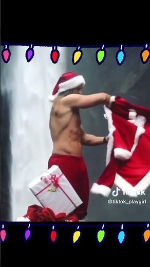 Christmas: Sexy Santa's: Shirtless muscled 🔥Santa w/ very long hair, puts on his "Santa" hat & coat