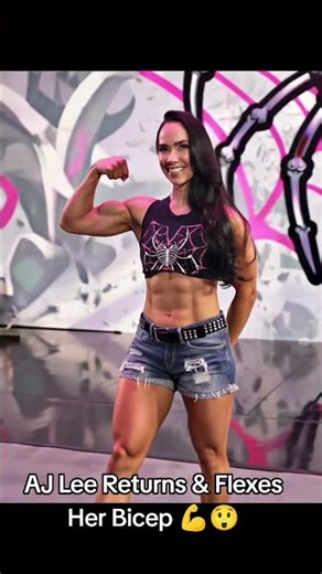 AJ Lee Returns & Flexes Her Biceps 💪 #ajlee #shorts