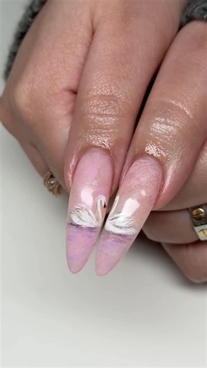 alexia ♡ on Instagram: "valentine’s day swan set 🦢🎀✨ @shopagaloreco products used: *buff structure gel *pale pink, blush, taffy, lilac, iris, ultra white, eggshell, stone, papaya, ultra black *bling gel *diamond steel top coat use code ‘ALEXIA10’ at checkout 🤎 #nails #nailart #nailinspo #valentinsday #vdaynails #nailarttutorial #clt #cltnailtech"