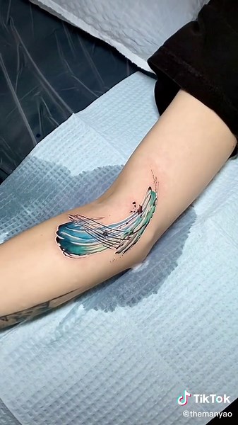 Watercolor Wave Tattoo Ideas for Women