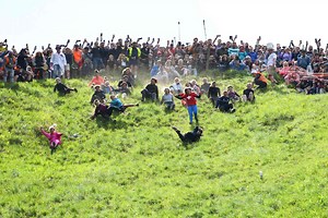 Canadian Woman Gets Knocked Unconscious During Cheese Rolling Contest, Wins Anyway