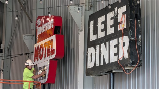 See the restored Modernaire Motel and Lee's Diner signs installed