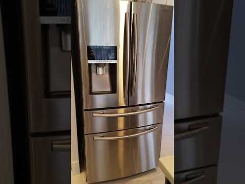 Fridge Refrigerator ice maker stuck. Empty ice bucket solution, easy fix.