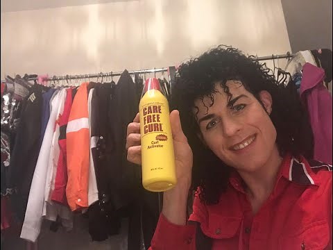 What did Michael Jackson Style his hair with?