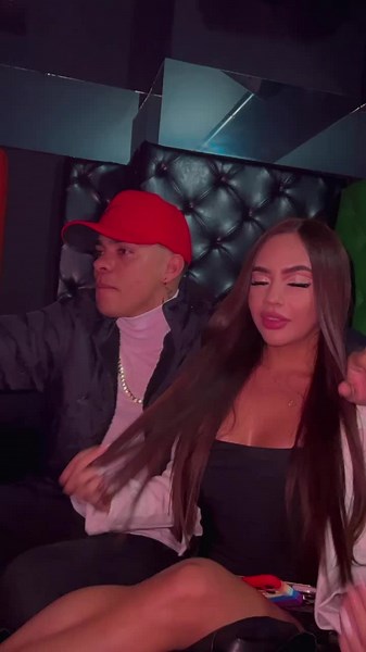 Nightclub Interaction: A Stylish Evening Encounter