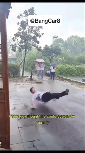 "Epic Rain Slip FAIL! 😂"