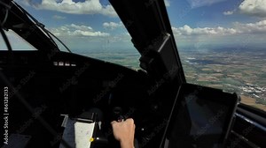 Piloting an airplane. Close-up view of a pilot handling the flight controls. 4K 60FPS Stock Video