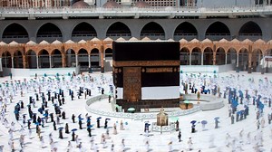 Pilgrims gather in Mecca for physically distanced hajj