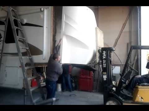 Removing a front cap on a fifth-wheel camper