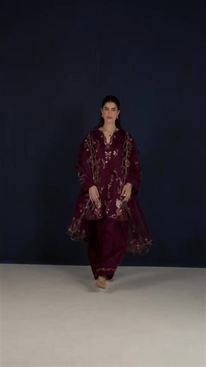 EID LUXE Immerse yourself in rich burgundy silk, masterfully embroidered and elevated with delicate organza accents. From the intricately detailed shirt and sleeves to the flowing dupatta and silk pants, every element is designed to embody refined Eid luxury. Launching this Saturday, 28th February at 4:00 PM. | Iznik