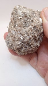 Muscovite Mineral Specimen: Shimmering Silvery Gemstone from Eastern Europe
