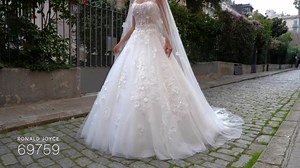 This show stopping floral ballgown wedding dress is perfect for a...