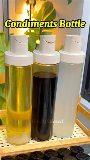 Condiments Glass Bottle | Kitchen Essentials Upgrade your kitchen setup with this glass condiment bottle set that is perfect for vinegar, soy sauce, fish sauce, and cooking oil, featuring an automatic lid for easy one hand pouring, a clear glass body so you can see what is inside without labels, and a built in rubber seal that helps reduce leaks while the covered spout helps keep dust and insects out, making your counter more organized and cooking faster. #condiments #bottle #condimentsbottle #k