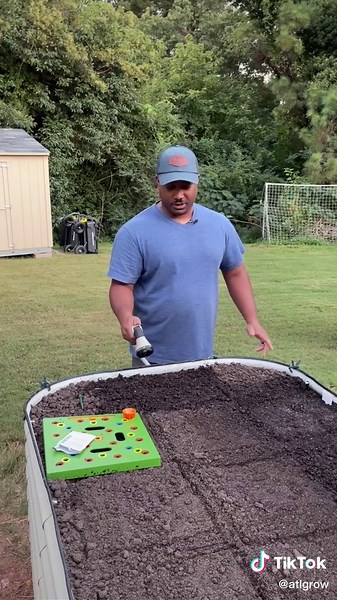 Sowing Cherry Belle Radish Seeds in a Square Foot Garden