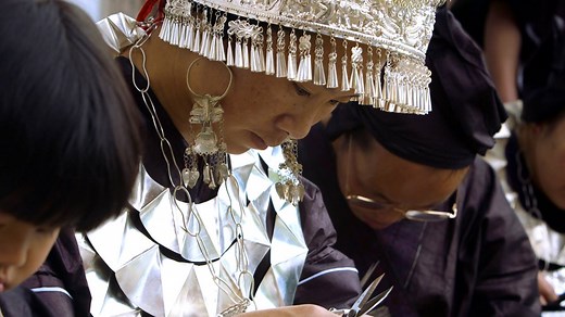 3.6M views · 12 reactions | Miao embroidery is a unique and incredible skill—weaving actual metal thread into intricate patterns to create beautiful garments. A tradition over 500 years old, Miao tin embroidery is sadly a disappearing art, as fewer and fewer girls are willing to take on the daunting and lifelong pursuit of the craft. | Great Big Story | Facebook