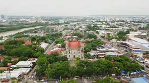 MOLO-MOMENT SA MOLO Witness Molo from a breathtaking aerial perspective, showcasing the majestic Molo Church with its neo-Gothic architecture and the lush greenery surrounding it. The drone view captures the serene Molo Plaza with its manicured landscape and dancing fountain. #RISEIloilo #UswagIloilo #UswagToTheNextLevel | Jerry Treñas