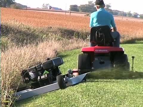 Kunz AcrEase 60" Pull Behind Finish Cut Mower Towed By A Riding Mower