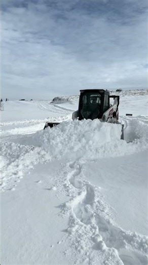 2022 Bobcat T66 snow removal with a high capacity 108” snow bucket