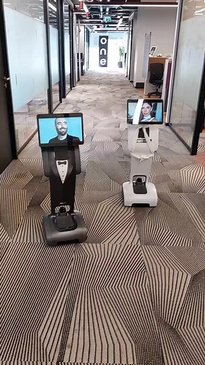 Humanoid Robots in a Modern Office Environment