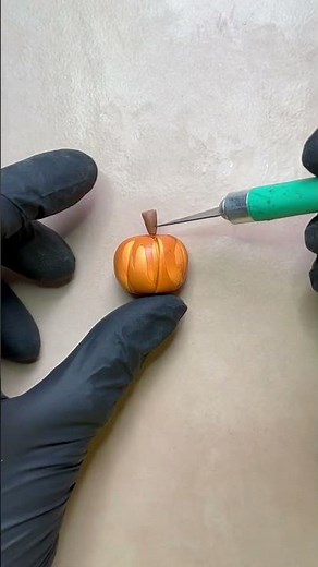 Crafting a Miniature Pumpkin with a Spider for Halloween