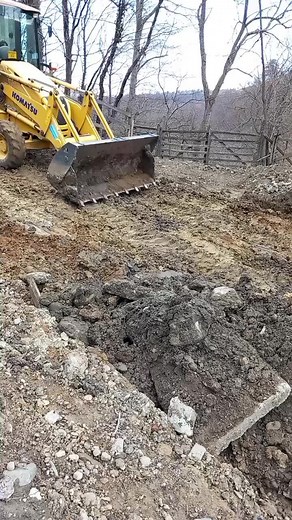 Komatsu Backhoe Loader in Earth-Moving Action