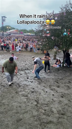 This instantly became our entertainment while waiting for red hot chili peppers 😂😂 #mudslide #falling #fall #rain #slipnslide #lollapalooza #2023 #mud #festivals #funny #chicago #fyp @Lollapalooza