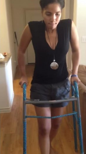 Multiple Sclerosis battle with walker in 2014, prior to being confined to a wheelchair again.