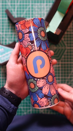 How to Wrap and Tape ✨PERFECT✨ 20oz Skinny Tumblers! • Trim but leave white on overlap side • start wrapping with image and top of tumbler flush on table • get a tight wrap. Using the Pinch Perfect Tool or hands if possible • tape top and bottom along with seam line of course •apply pressure to overlap, underlap, and top/bottom edges Give it a few good presses in the heat press and enjoy your beautiful 20oz skinny tumbler! #tumblermaker #tumbler #tumblermakers #tumblersublimation #sublimationtum