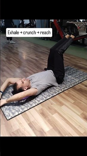 Toe Touch Crunches: full range, full control, full core engagement.