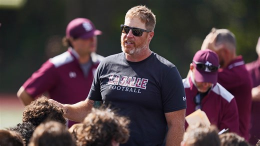 A winning start: Ex-Patriot Dan Koppen all smiles after La Salle coaching debut