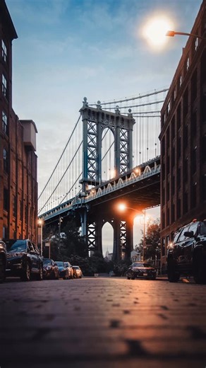 Chris Ha | Photography on Instagram: "Copy my exact Adobe Lightroom settings for this Brooklyn Bridge sunrise in Dumbo. This view of the Manhattan Bridge framed from Washington Street in Brooklyn has been photographed thousands of times - cobblestone streets, leading lines, and the Empire State Building sitting perfectly in the arch. I went at sunrise, when the light was just starting to spill across the bridge and the streets were still quiet enough to shoot clean frames. The composition alread