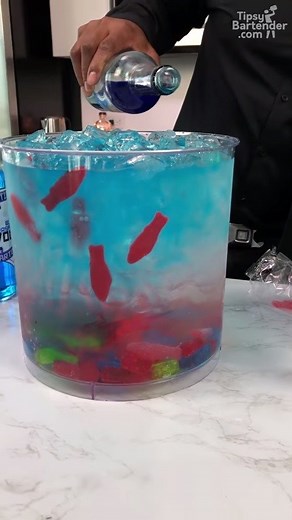 14M views · 36K reactions | Who's brave enough to make a punch in a fish tank?  | Tipsy Bartender | Facebook