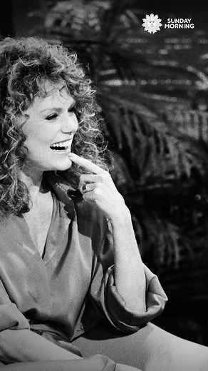 Actor Dyan Cannon shares a different side of late-night host Johnny Carson. Reflecting on their dynamic, she compares him to her ex-husband, Cary Grant, calling Carson uniquely approachable and beloved. A 1985 interview captured their undeniable chemistry, leaving an air of mystery that still lingers: “You will never know.” | CBS Sunday Morning