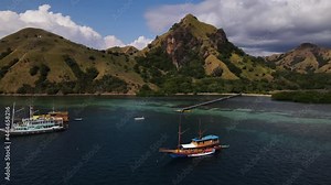Yachts And Passenger Boats At The Flores Sea On Tour Of Komodo Island In East Indonesia. aerial