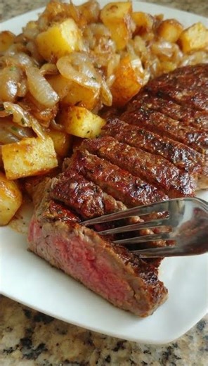 Sliced Steak with Skillet Potatoes and Caramelized Onions