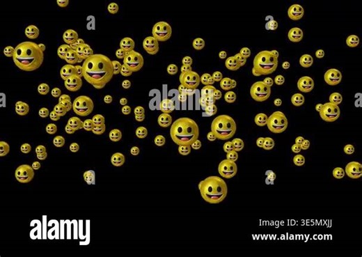Numerous yellow smiley face emojis floating against a black background Stock Video Footage - Alamy