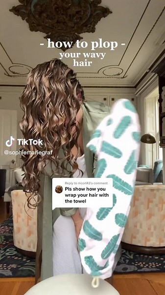 Replying to @mcort43 here’s how to plop your hair! This helps cut down on dry time and also increases definition. This towel is from @Coco & Eve but you could also use a T-Shirt! Same idea, but lay it out with the neck closest to you, flip the body up over your head, and tie the arms to secure. #wavyhairtips #wavyhairtutorial #howtoplop #ploppingtutorial #ploppstudio #2ahair #2bhair #bowlmethodwaves