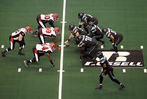 What is the difference between arena football and NFL?