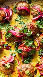 Satay-Inspired Chicken Meatballs in Coconut-Peanut Sauce https://dishingouthealth.com/creamy-coconut-chicken-satay-meatballs/ | Dishing Out Health