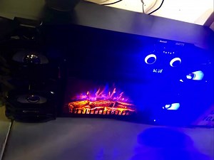 Check out these bada** new entertainment stands we go in!! 10,000 watts speakers and fireplace?!?! | Rosebud Exchange