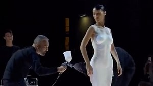 Bella Hadid has dress sprayed on at Paris Fashion Week