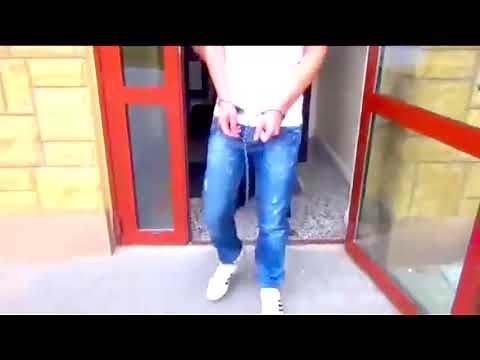 Polish prisoner escorted in handcuffs and shackles
