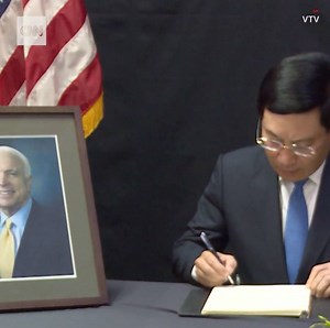 "Senator John McCain has always been a symbol of the generation of lawmakers - veterans of the Vietnam War, who have been leading and making great contributions to healing the wounds of war." Vietnam's deputy prime minister and foreign minister signed a book of condolence for the late John McCain at the US Embassy in Hanoi. https://cnn.it/2PEwOOh | CNN