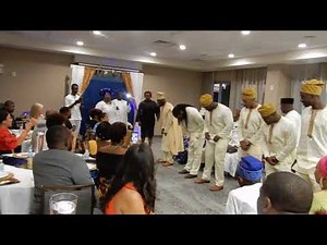 DSCN0846 Nigerian engagement ceremony / groom and groomsmen lay prostrate according to culture