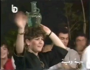 A folkloric scene with dancing with the water jug 1980' s Lebanon #folklore #dance #lebanon🇱🇧 #culturalheritage #beirut #levant #fashion #bellydance #dabke #دبكة | Lebanese Fashion History