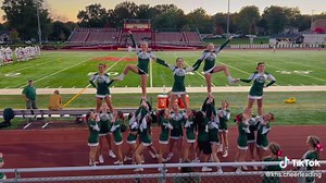 Exciting Cheerleading and Football Pyramid Stunts